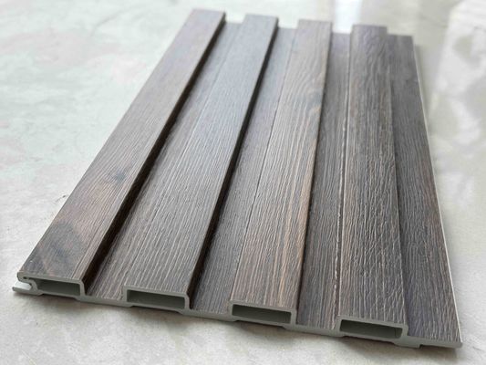 Δικαιολογημένη τιμή B1 Wpc τοίχωμα εσωτερικό προσαρμοσμένο κούφιο σχεδιασμό 3D για τοίχους εσωτερικού